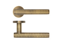 Favo Lever On Round Rose Antique Brass Finish