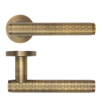 Favo Lever On Round Rose Antique Brass Finish